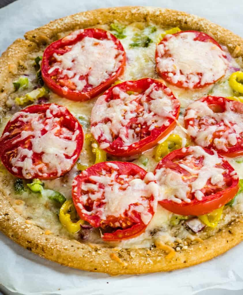 whole wood pellet pizza with tomatoes