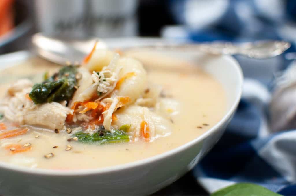 gnocchi and chicken in creamy soup broth