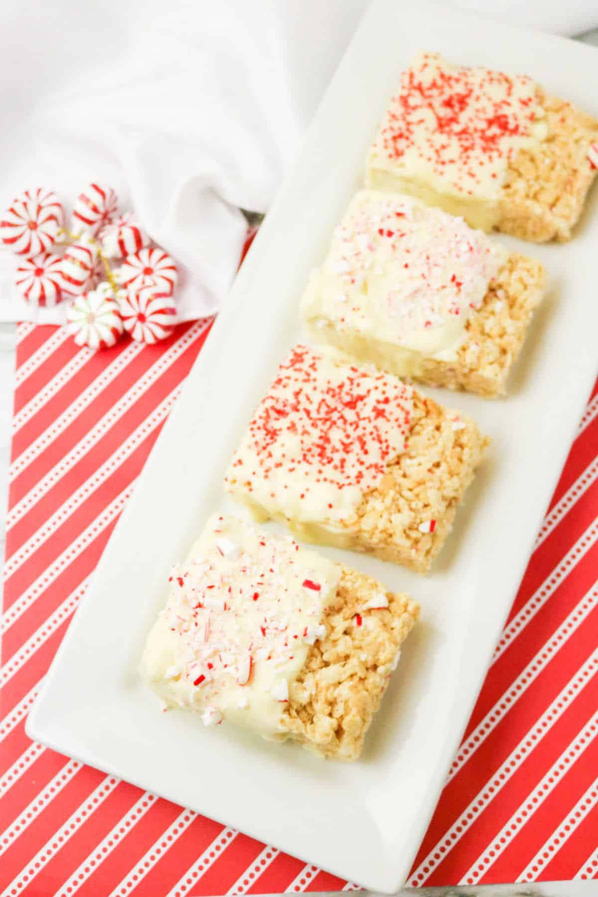 peppermint white chocolate rice krispie treats on white plate