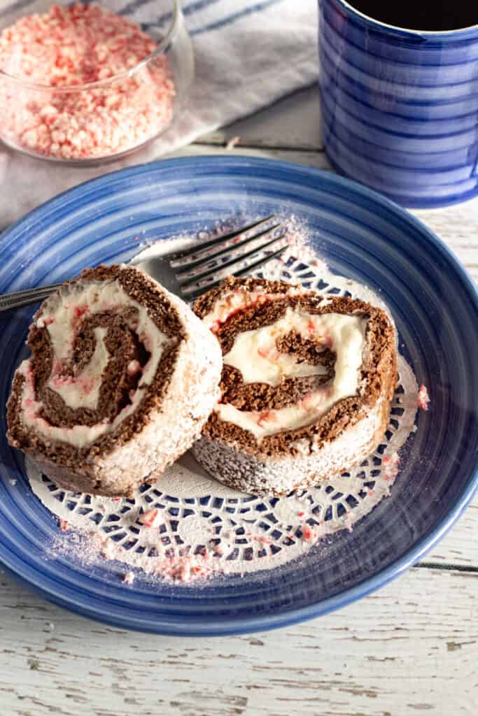 two slices of chocolate cake roll with peppermint filling