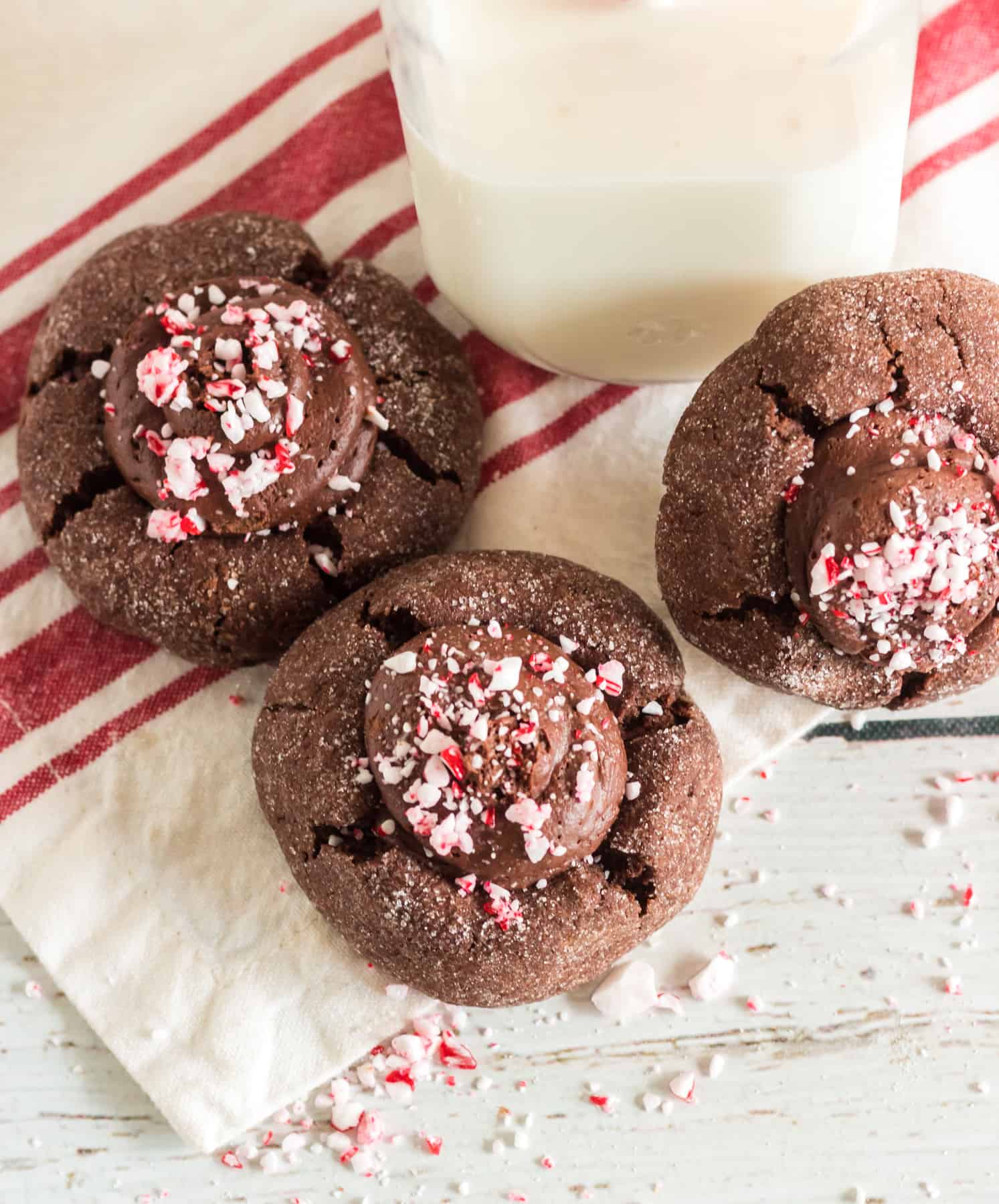 three peppermint fudge cookies on red and white napkin