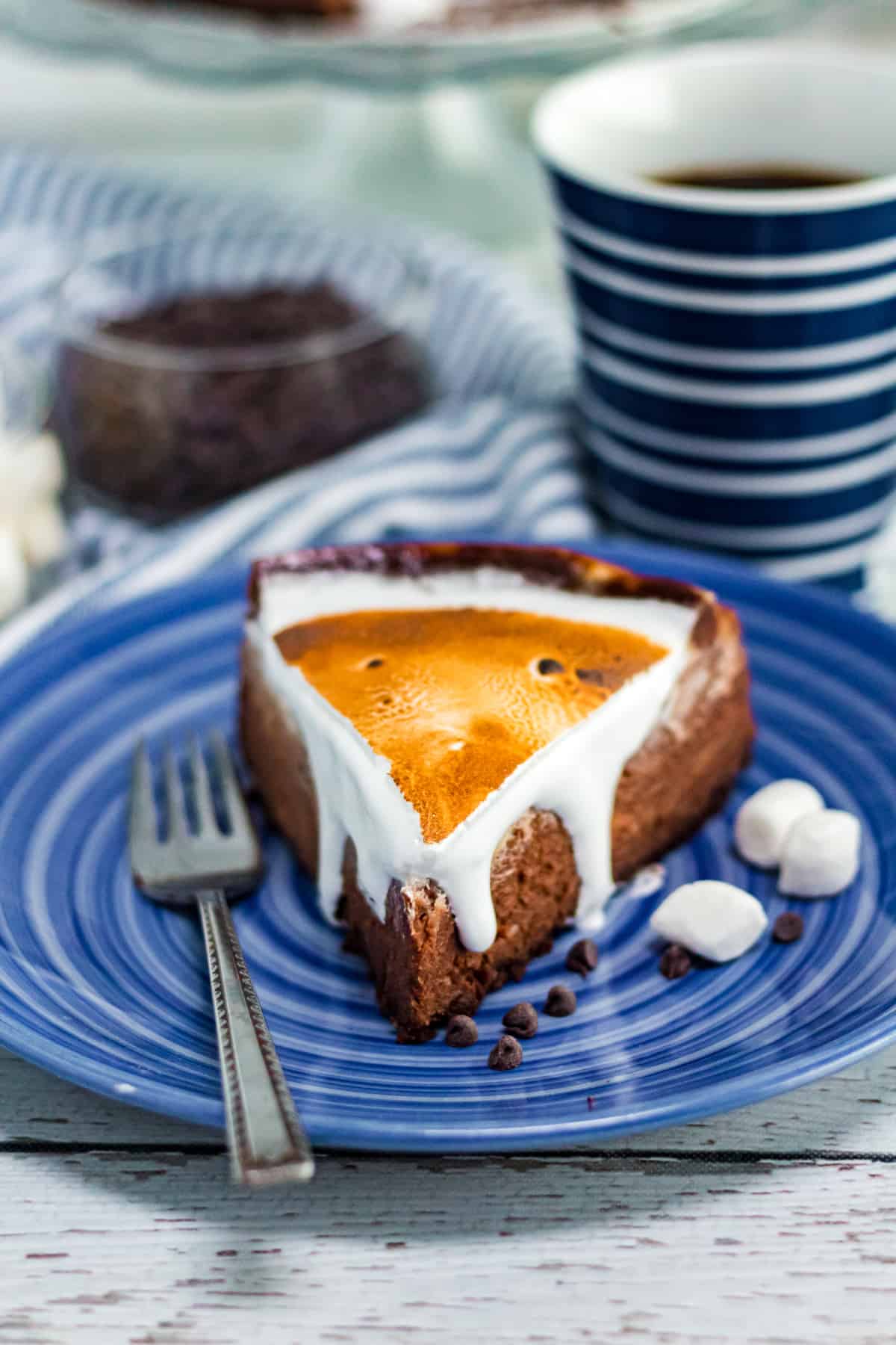 slice of hot chocolate cheesecake on blue plate