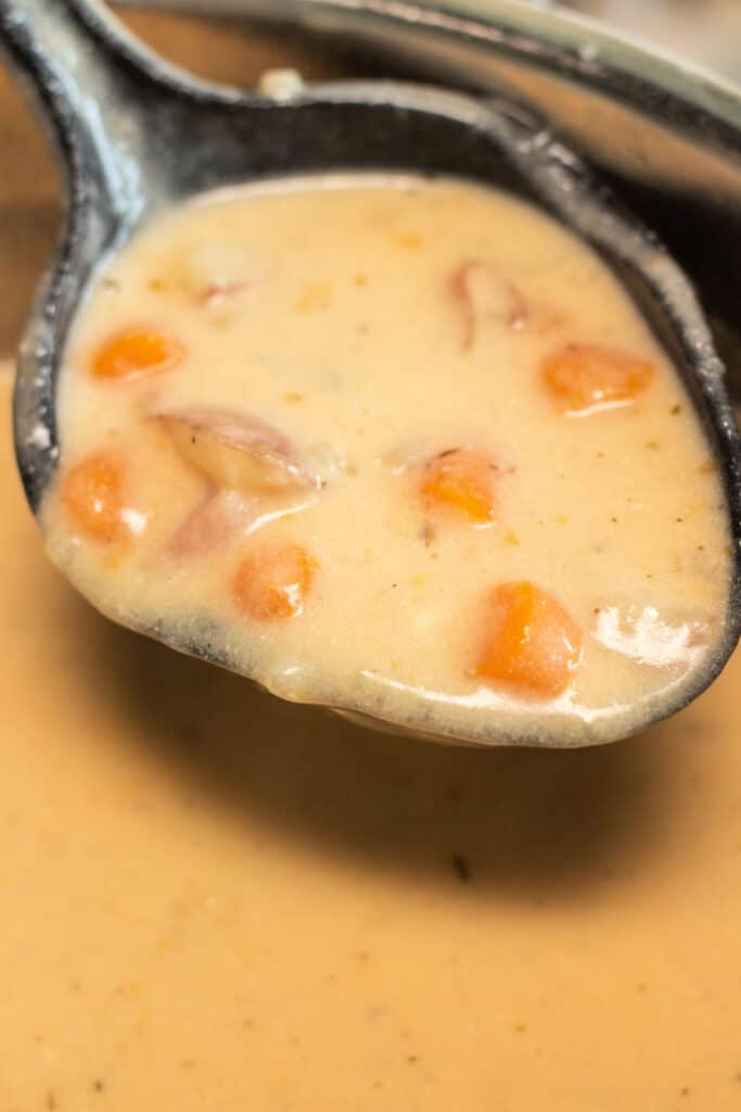 ladle of ham and potato soup in instant pot