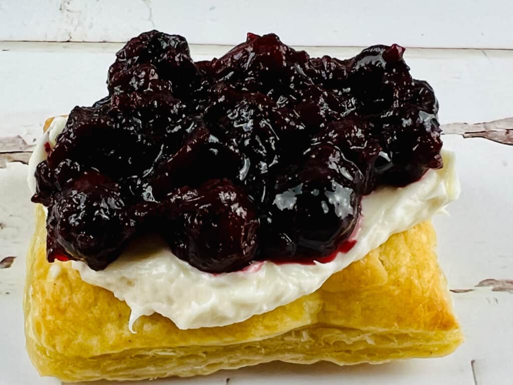 blueberry filling on puff pastry with cream cheese