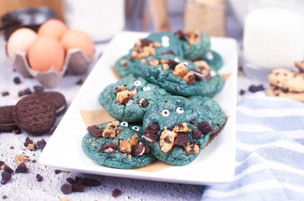 cookie monster cookies on white plate with blue napkin