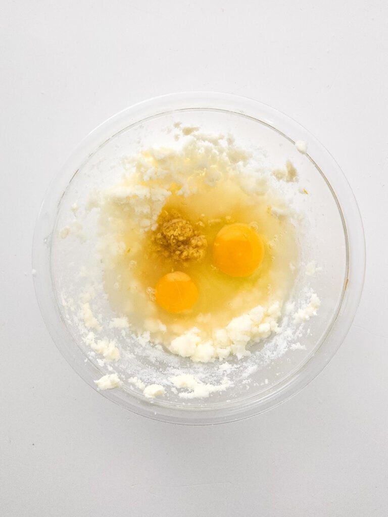 eggs, juice and lemon zest in bowl