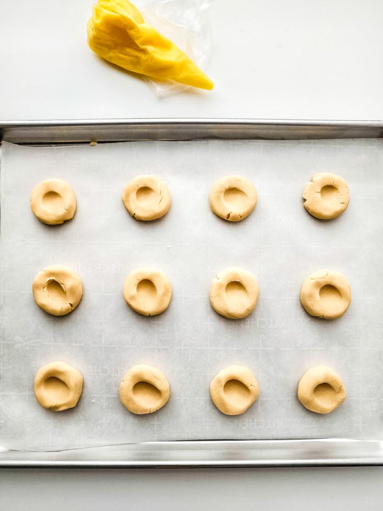 Make thumbprints into dough balls