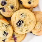 blueberry cheesecake cookies on a white plate.