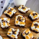 s'mores brownies on round wooden tray